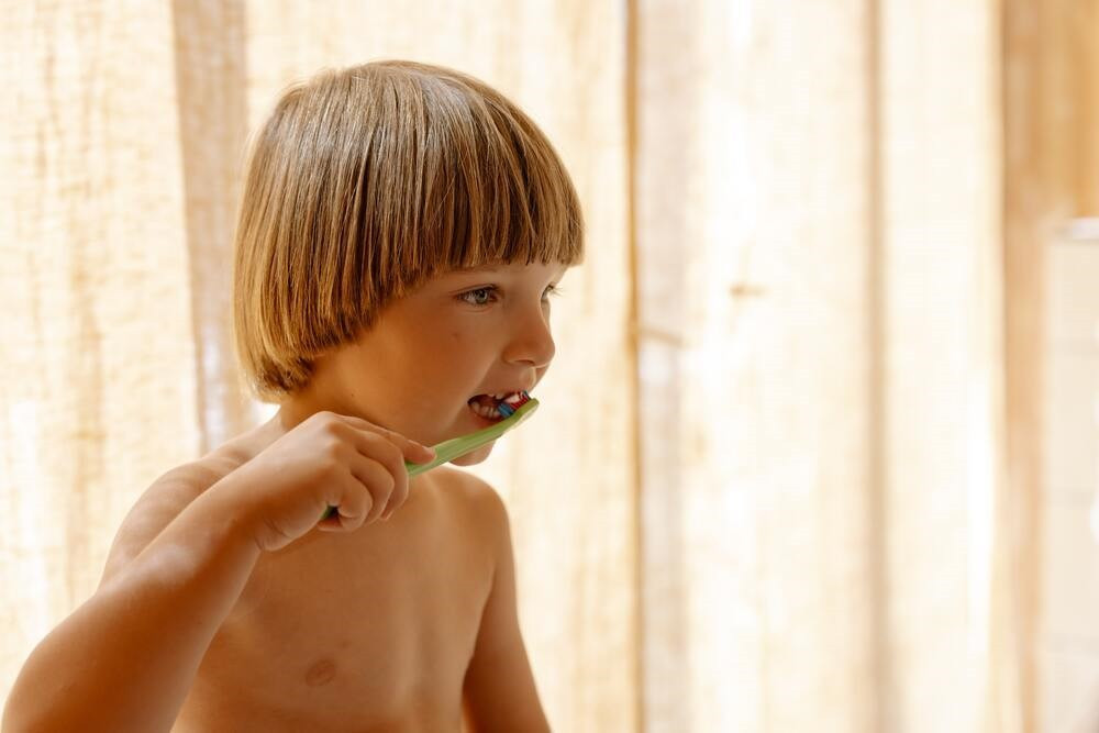 Come prendersi cura dei denti da latte
